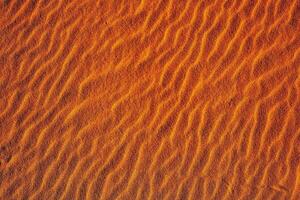 laranja areia com ondulado linhas foto