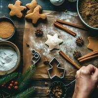 plano deitar do cozinhando caseiro Natal cozimento ingredientes ou Pão de gengibre biscoitos colocada em mesa conceito de ai gerado foto