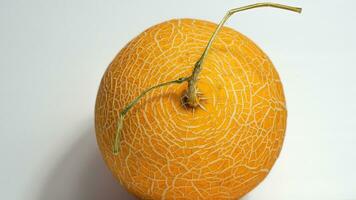 doce amarelo Melão fruta com uma volta textura foto