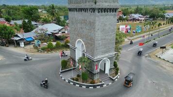 aéreo Visão do monumento de Centro ponto osso bolango, gorontalo às nascer do sol foto