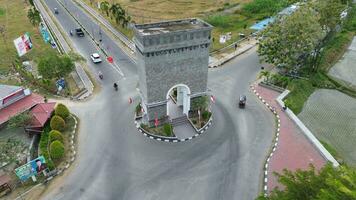 aéreo Visão do monumento de Centro ponto osso bolango, gorontalo às nascer do sol foto