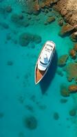 ai gerado topo baixa tiro do uma solteiro iate de uma coral recife com espaço para cópia de foto