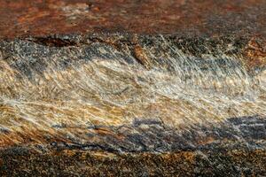 olho de cobra de pedra mineral macro na rocha um fundo branco foto