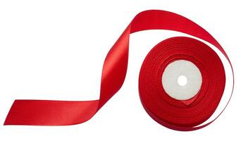 uma carretel com uma vermelho seda fita em uma branco isolado fundo, a objeto para decoração foto