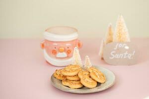 leite, biscoitos e Nota para santa noel. foto