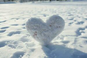 ai gerado inverno arte mão desenha uma coração dentro fresco, imaculado neve foto