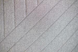 cinzento espinha de peixe tweed padrão, interior material fundo. tecido textura diagonal tecer do natural algodão ou linho têxtil material. decorativo tecido para cortina, mobília, paredes, roupas foto