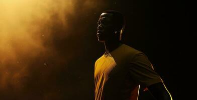ai gerado uma futebol jogador dentro uma amarelo camiseta em uma Sombrio fundo foto