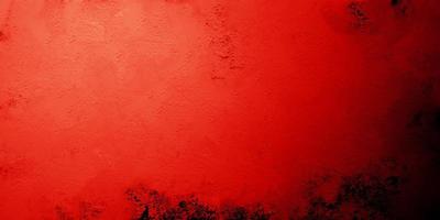 fundo vermelho assustador. grunge escuro textura vermelha concreto foto
