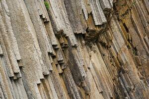 natural fundo, Rocha fragmento a partir de vulcânico lava pilares foto