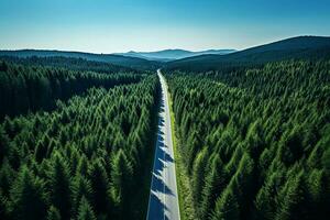 ai gerado aéreo Visão do uma estrada dentro a meio do a floresta foto