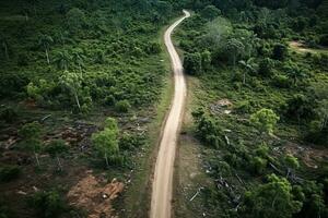 ai gerado aéreo Visão do uma estrada dentro a meio do a floresta , estrada curva construção acima para montanha foto