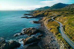 ai gerado aéreo Visão do estrada, rochoso mar costa com ondas e pedras às pôr do sol panorama com lindo estrada, transparente azul água, pedras. topo Visão a partir de zangão do rodovia dentro verão foto