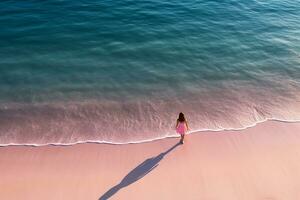 ai gerado aéreo Visão do a mulher dentro Rosa de praia e azul mar foto