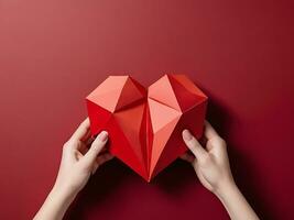 ai gerado 3d poligonal vermelho coração mantido de fêmea mãos dia dos namorados dia conceito foto