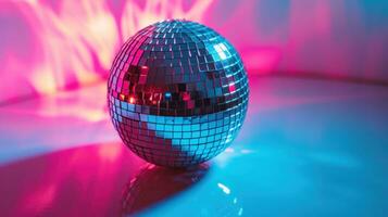 ai gerado néon discoteca bola refletindo vibrante Rosa e azul luzes, colocada em uma lustroso azul superfície. ideal para festa, evento promoções ou relacionado à música contente. foto