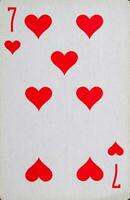 a jogando Sete cartão do corações, a terno do corações foto