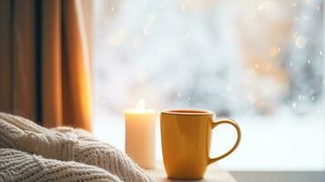 ai gerado inverno feriados, calma e acolhedor lar, copo do chá ou café caneca e tricotado cobertor perto janela dentro a Inglês campo cabana, feriado atmosfera foto