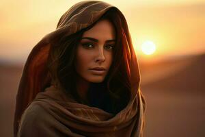 ai gerado retrato do uma jovem muçulmano mulher dentro uma hijab dentro a deserto contra a pôr do sol, árabe mulheres face contra a pôr do sol ai gerado foto