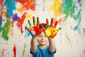 ai gerado pequeno Garoto mostra dele mãos coberto com brilhante multicolorido pintura foto