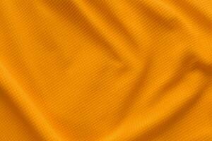 cor laranja roupas esportivas tecido jersey camisa de futebol textura vista superior foto