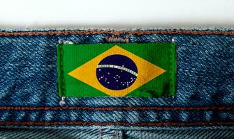 bandeira em a rótulo do a jeans foto