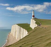 ai gerado branco giz falésias e farol em a jurássico costa dentro Dorset, Reino Unido foto