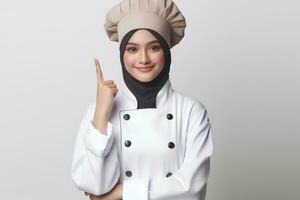 ai gerado a ásia fêmea chefe de cozinha vestindo uma hijab em uma branco fundo foto