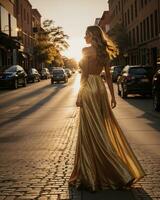 ai gerado lindo jovem mulher dentro uma grandes amarelo vestir caminhando em a rua às pôr do sol. ai generativo foto