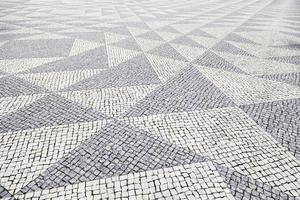 chão de pedra típico de Lisboa foto