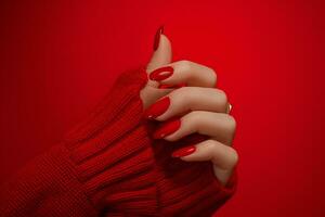 ai gerado uma manicuro dentro vermelho com mão com vermelho unha polonês foto