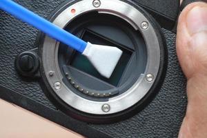 close up da limpeza do sensor da câmera, foto