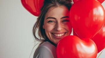 ai gerado dia dos namorados dia conceito, radiante alegria - mulher com vermelho coração balões a comemorar dia dos namorados dia foto