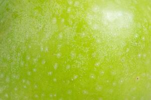 a textura do uma delicioso fresco maçã Como uma fundo. maçã Como uma material para uma designer. foto