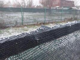 neve caiu em a cerca dentro a Vila foto