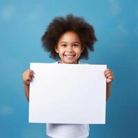 ai gerado sorridente pequeno menina segurando em branco branco Folha do papel em azul fundo foto