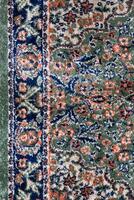 fechar acima texturas fundo e padrões dentro cor a partir de tecido tapetes. tradicional lã turco tapete. feito à mão e decorativo. foto