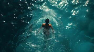 ai gerado topo Visão do mulher natação dentro a mar cinematográfico foto. Alto qualidade. ai generativo foto
