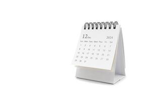 simples escrivaninha calendário para dezembro 2024 isolado em branco fundo. calendário conceito com cópia de espaço foto