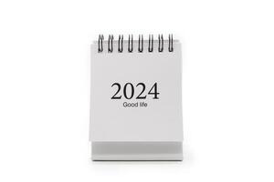 2024 ano calendário isolado em branco fundo. feliz Novo ano, metas, plano, Ação, missão e financeiro conceito. foto