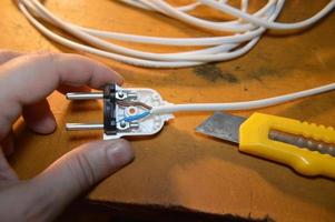 instalação de cabos de extensão e tomadas para eletrodomésticos eletrônicos foto