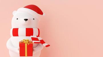 Feliz Natal e Feliz Ano Novo, banner de urso personagem de Natal usando chapéu vermelho e segurando um presente de Natal em um fundo rosa, renderização em 3D foto