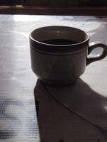 xícara de café na mesa foto