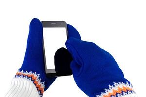 celular com luvas brancas e azuis isoladas no fundo branco foto