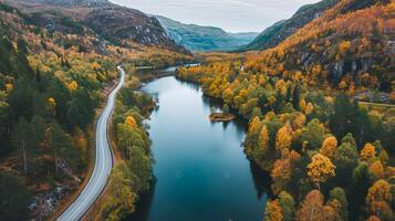 ai gerado foto do estrada ao lado calma rio, aninhado entre exuberante verde e outonal colori montanhas ai gerado