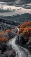 ai gerado foto montanha estrada pôr do sol cercado de Alto rochoso montanhas e vegetação debaixo uma nublado céu ai gerado