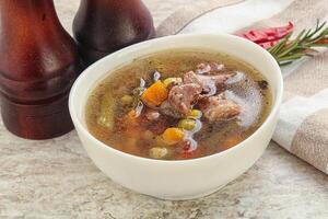 sopa com lentilha e frango foto