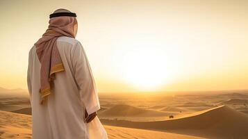 ai gerado árabe homem em pé dentro a meio do a deserto foto