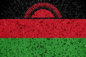 bandeira do república do malawi em uma texturizado fundo. conceito colagem. foto