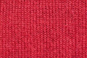 fundo de textura de tecido de lã de malha vermelha foto